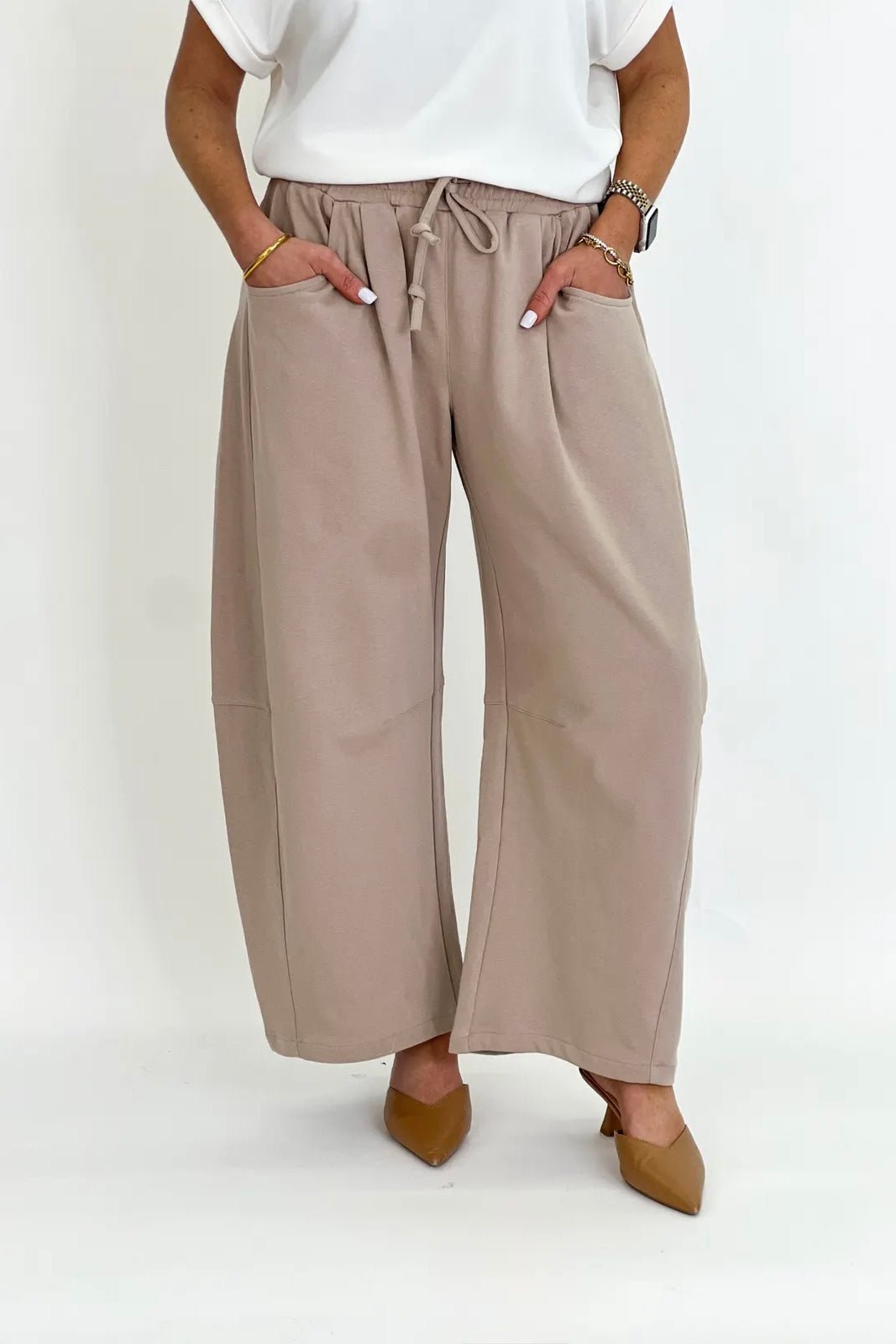 Knit barrel leg pants in taupe with a cropped hem