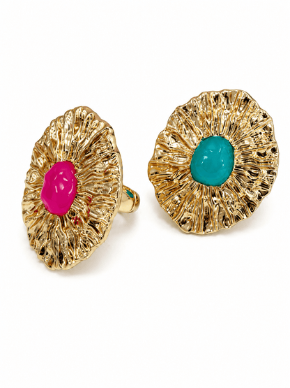 Gold-tone statement ring with a colored resin oval