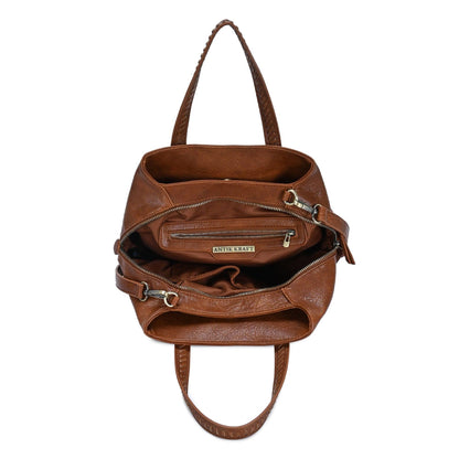Tan leather satchel interior view with open top and zipper closure