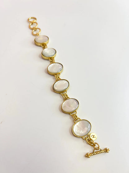 Circular gold-tone links forming a bracelet