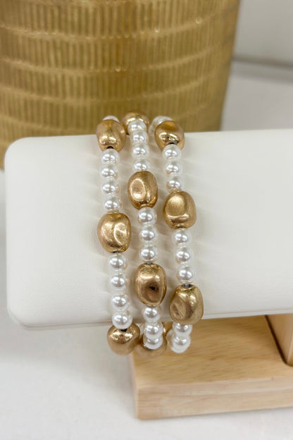 Three-row bracelet of copper coated organic beads