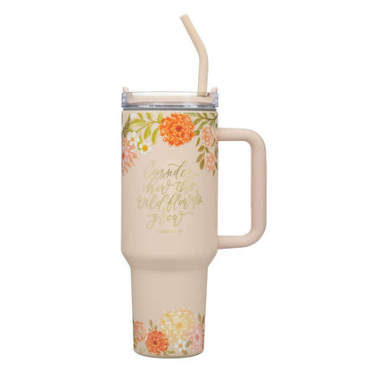 Orange tumbler printed with Consider How The Wildflowers Grow