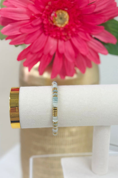 Turquoise bead bracelet with gold-tone accents