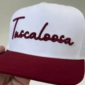Baseball hat with Tuscaloosa embroidered in cursive script