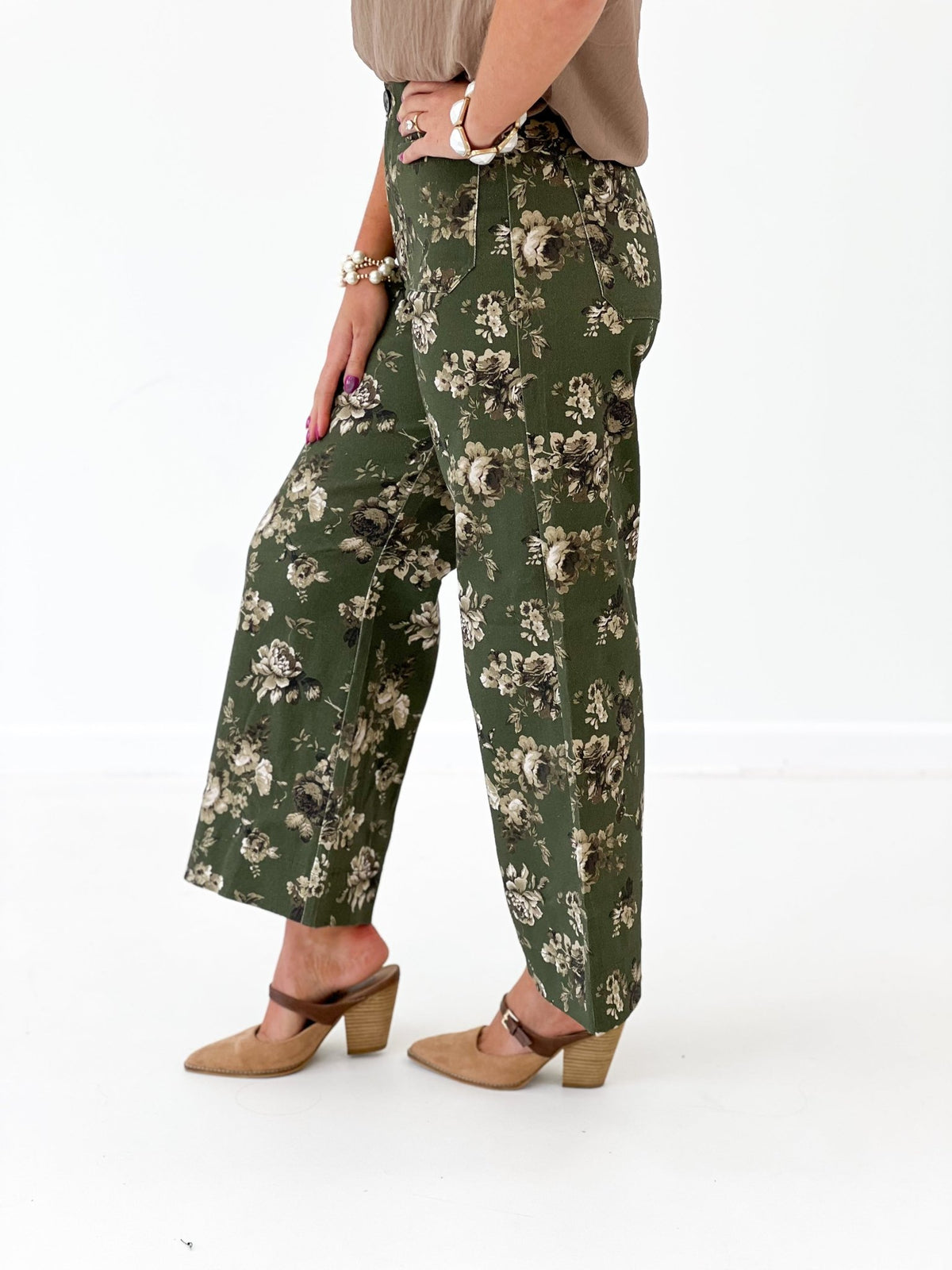 Olive floral pants with large pockets at the hip