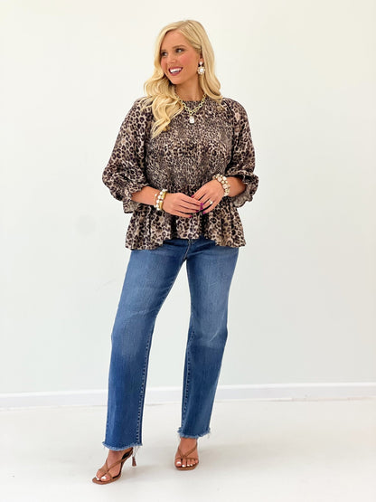 Olive animal print top with a relaxed body
