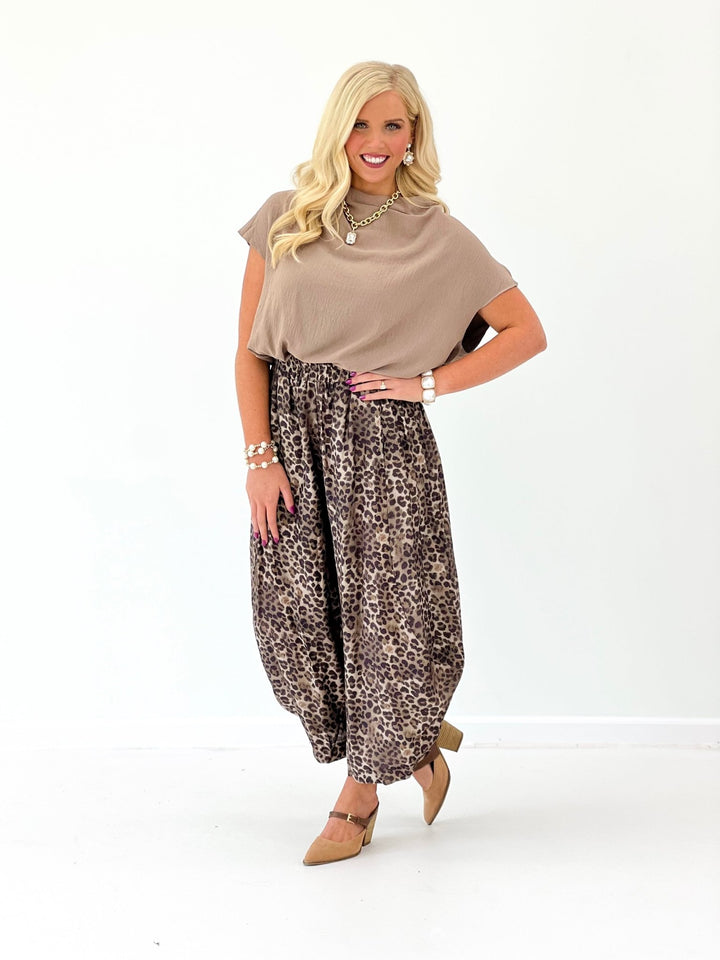 Leopard print pull on pants with an elastic waist