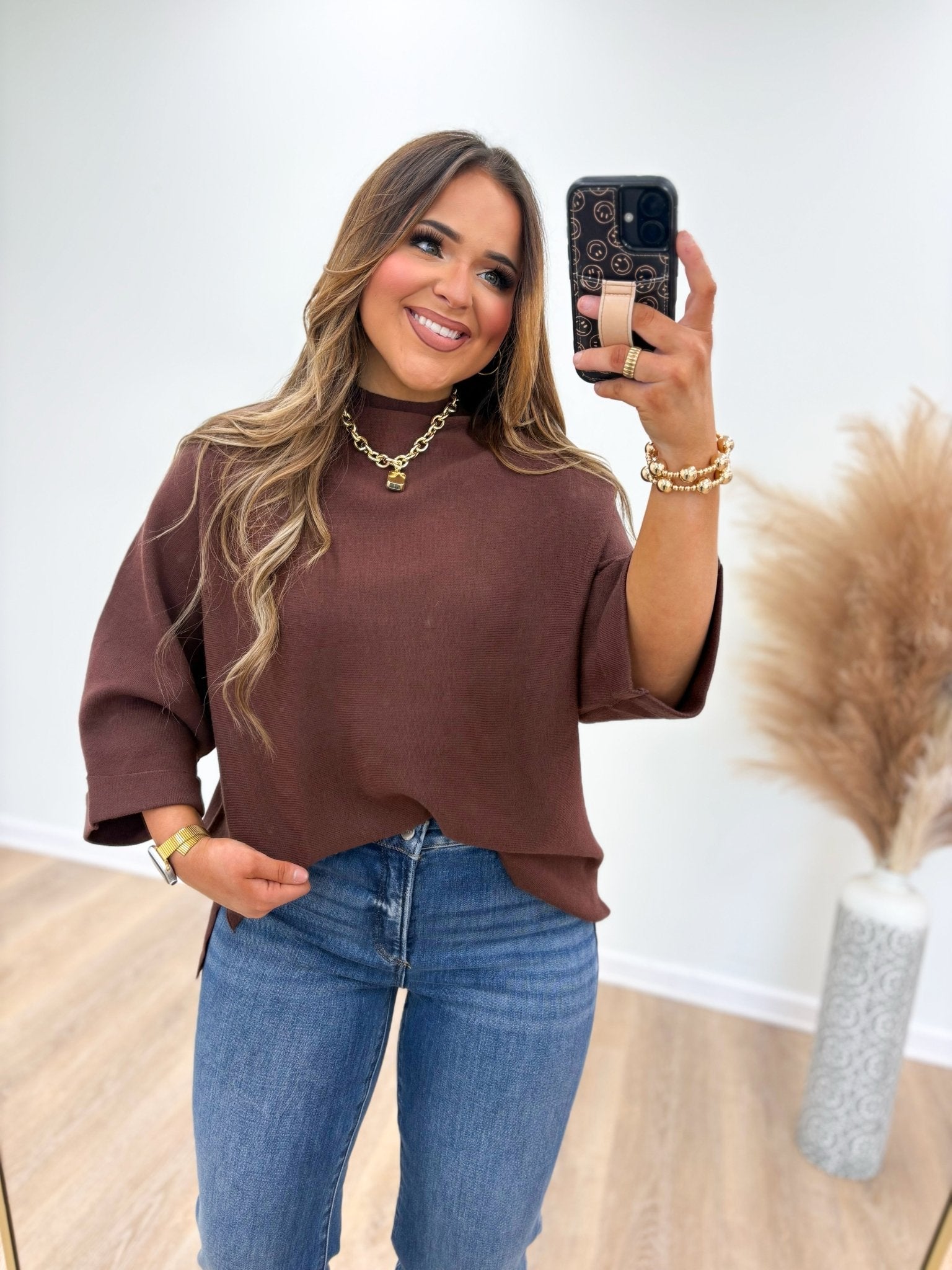 Mock neck sweater with a long relaxed body