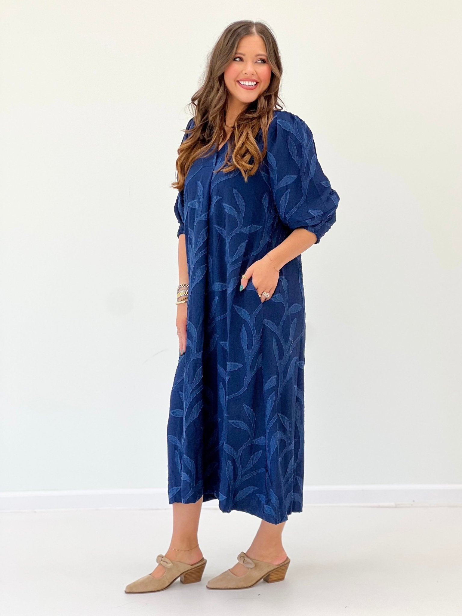 Collar detail on a navy midi dress