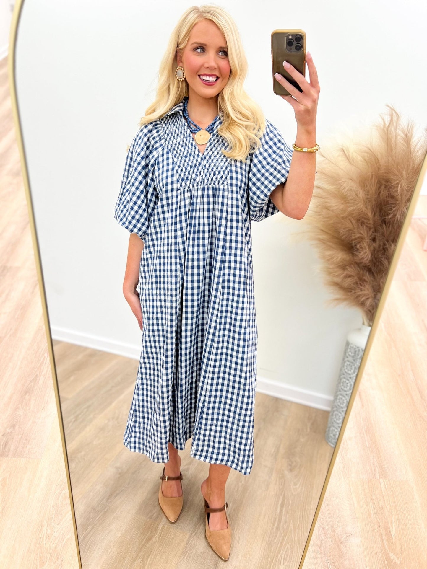 Denim blue plaid smocked midi dress with short sleeves and button-front