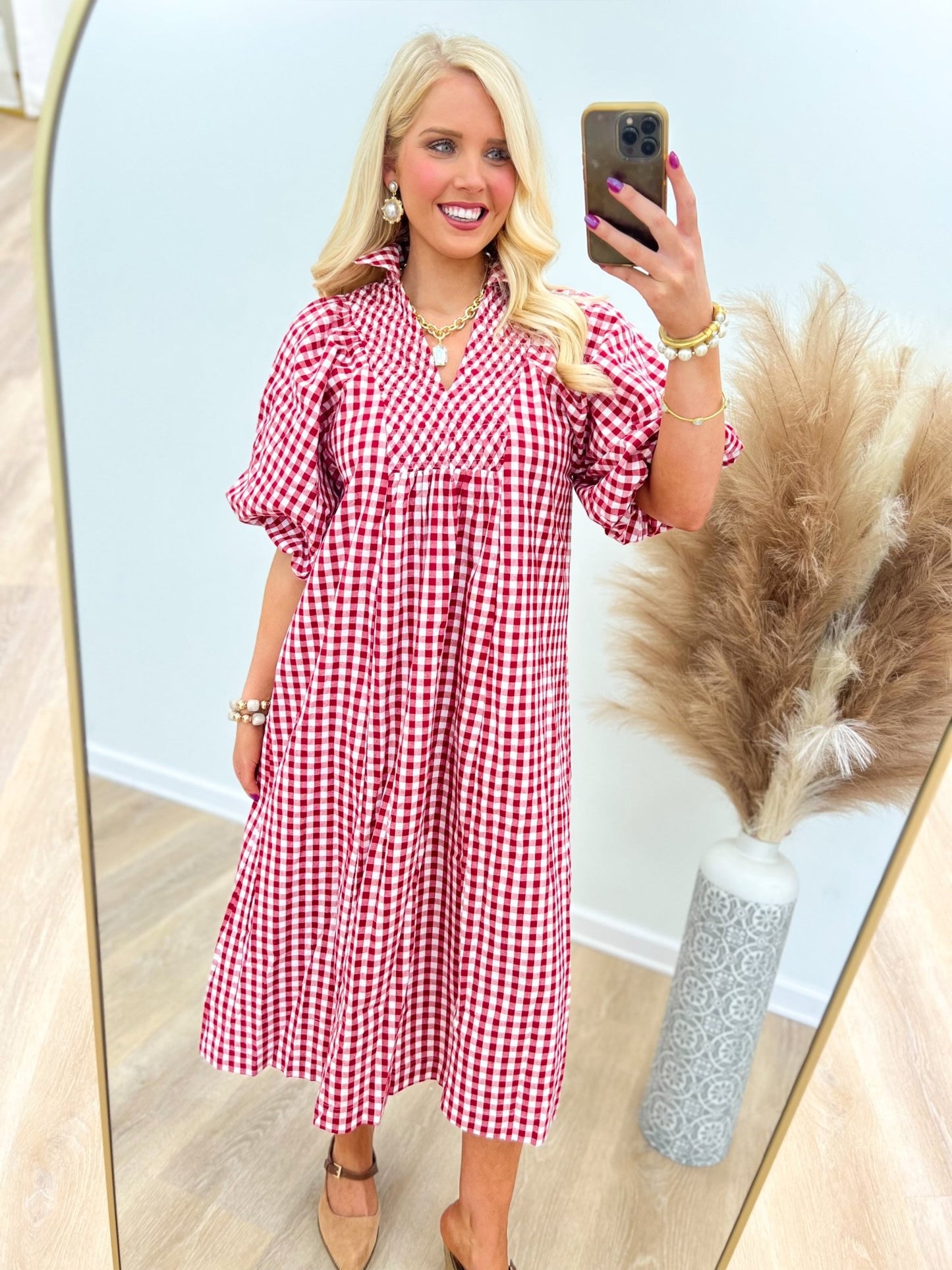 Smocked plaid dress cut to a midi length