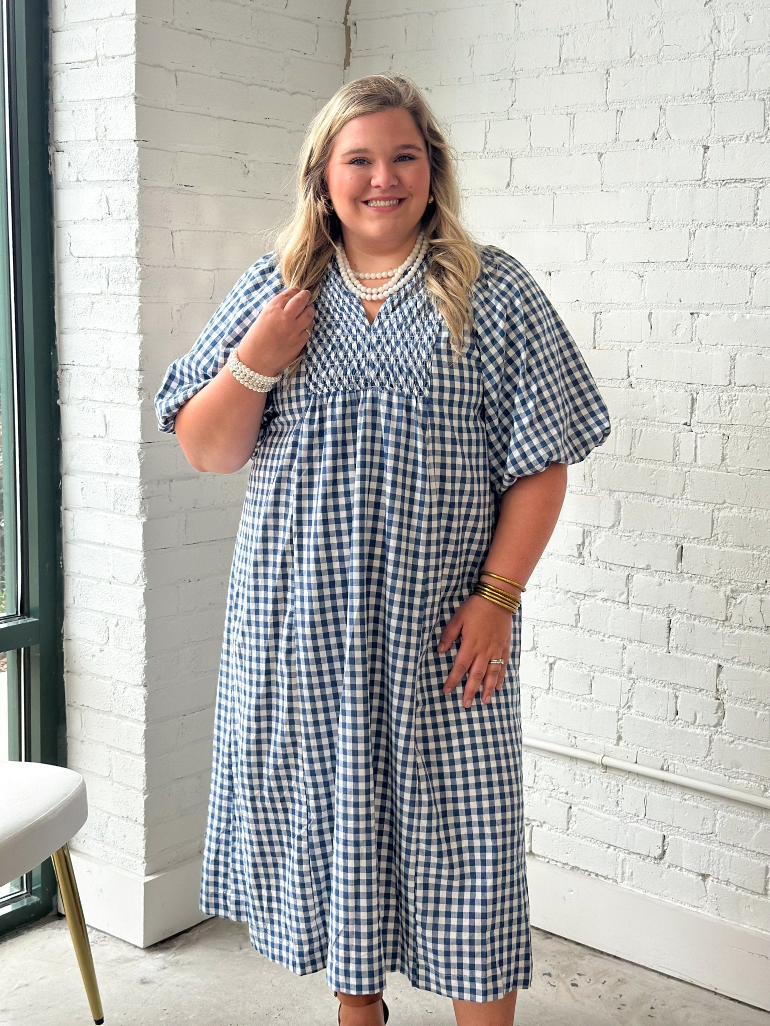 Plaid midi dress with a smocked yoke