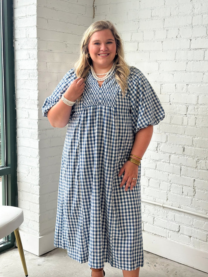 Plaid midi dress with a smocked yoke