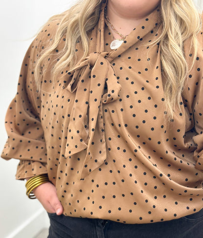 Dotted satin blouse with a glossy finish