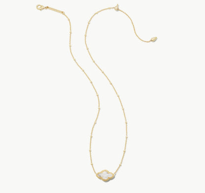 Gold pendant necklace with small ivory MOP heart-shaped charm, adjustable chain