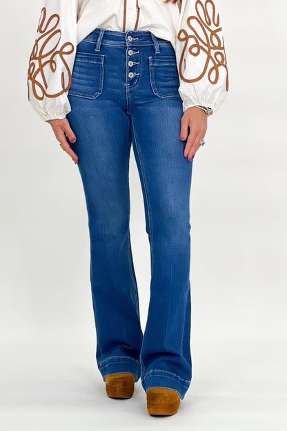 Mid-rise flare jeans with button fly and front pockets, dark blue wash