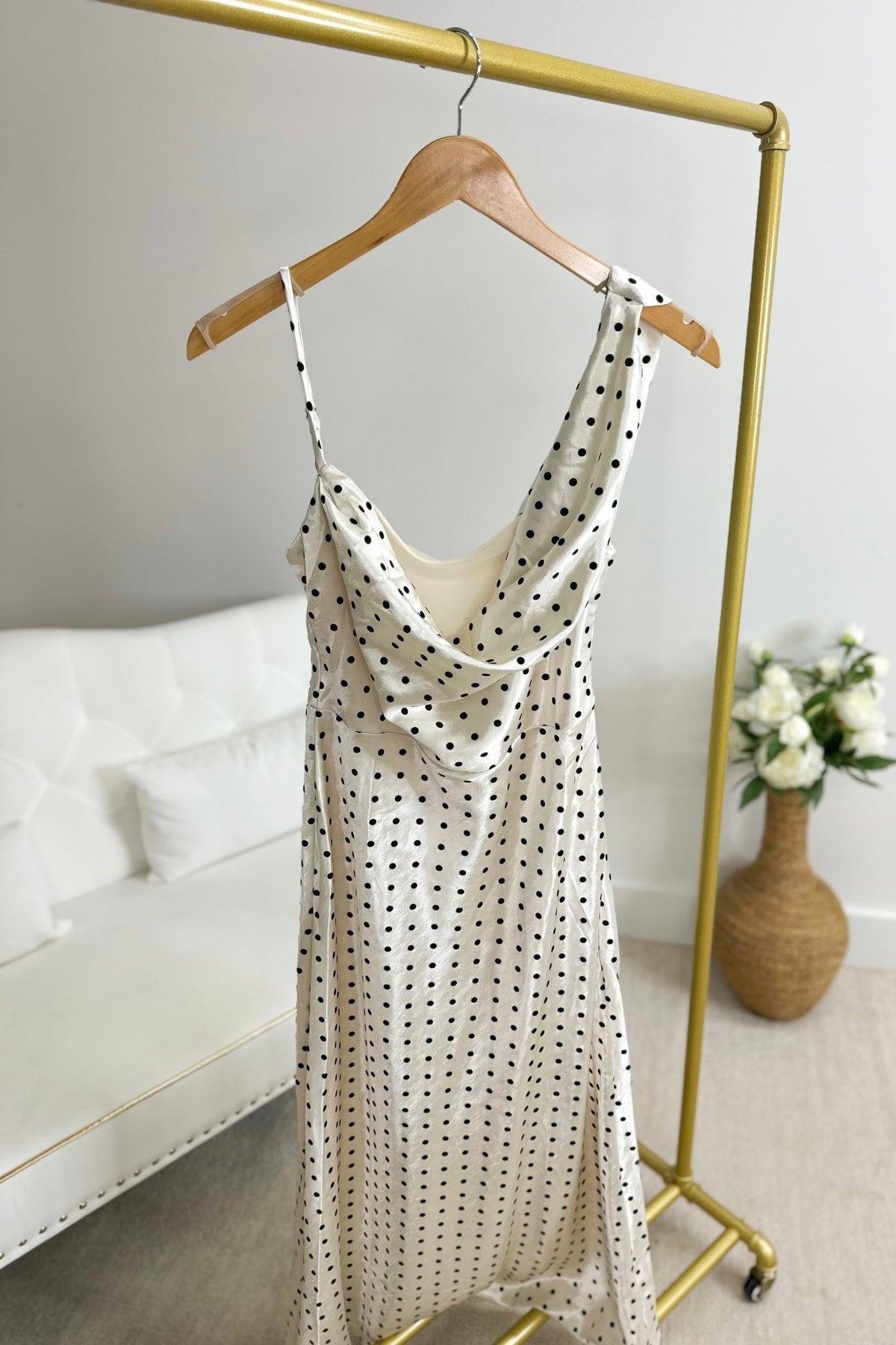 Black and white dress with a gathered draped neckline