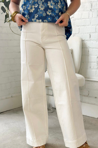 White high rise jeans with a five pocket cut