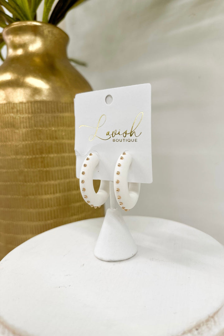 White and metal ball beaded hoop earrings