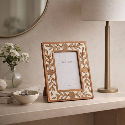 Petal-carved picture frame finished in white and brown wood