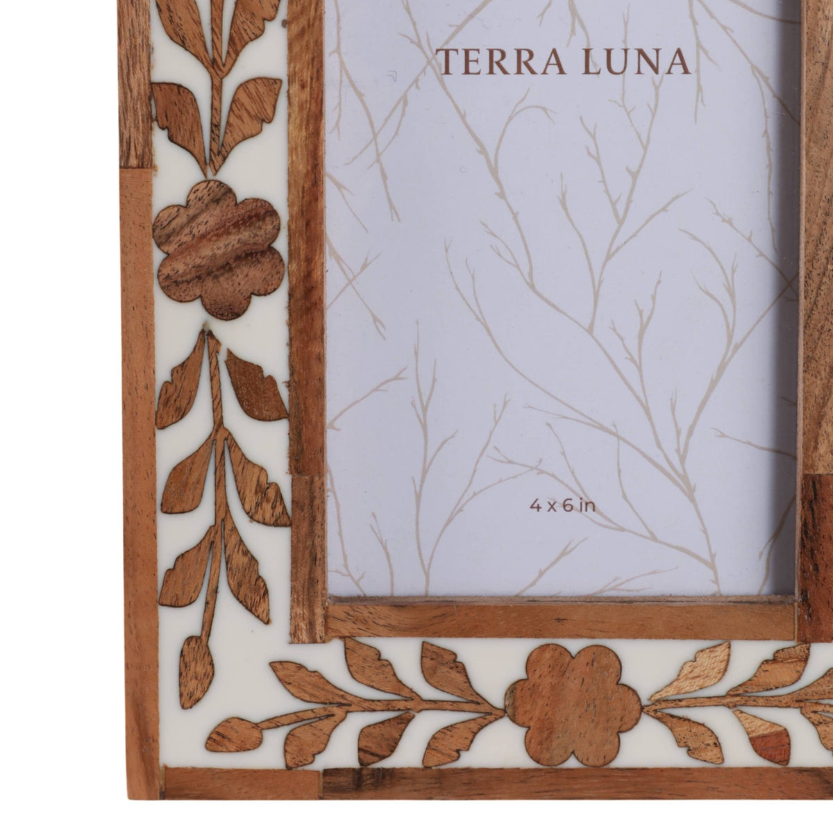 Wooden photo frame with a petal border in white and brown
