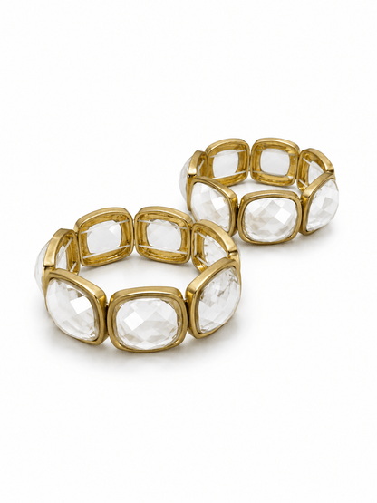 Wide faceted stone bracelet in a gold-tone setting