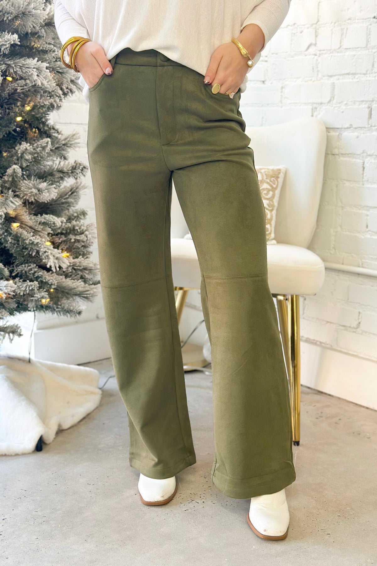 Olive suede straight-leg pants with front pockets and zip fly