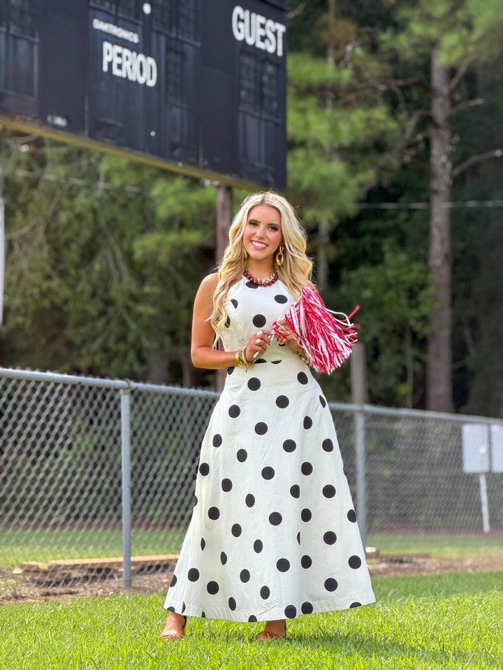 Cream and black polka dot midi dress with a high neckline