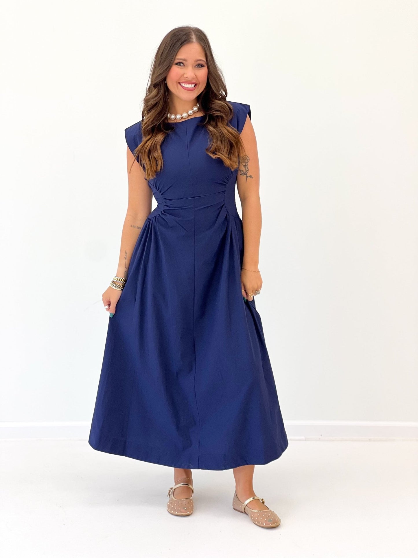 Midi length dress with vertical side seaming