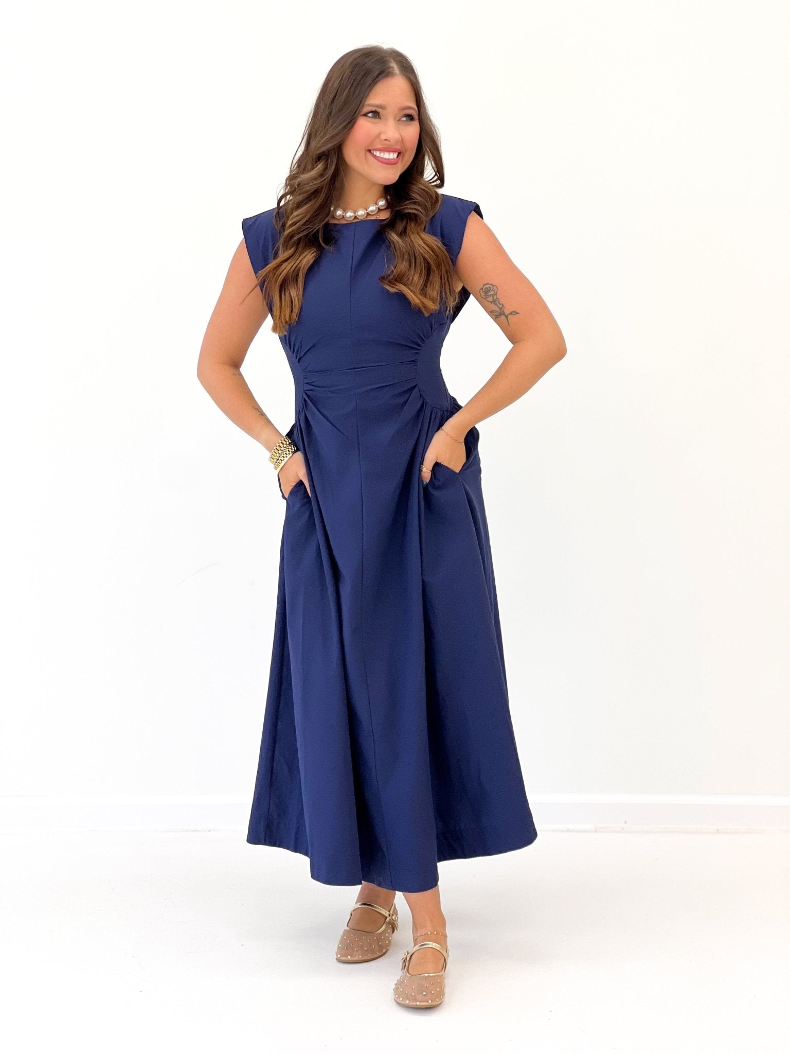 Solid midi dress with shaped side panels