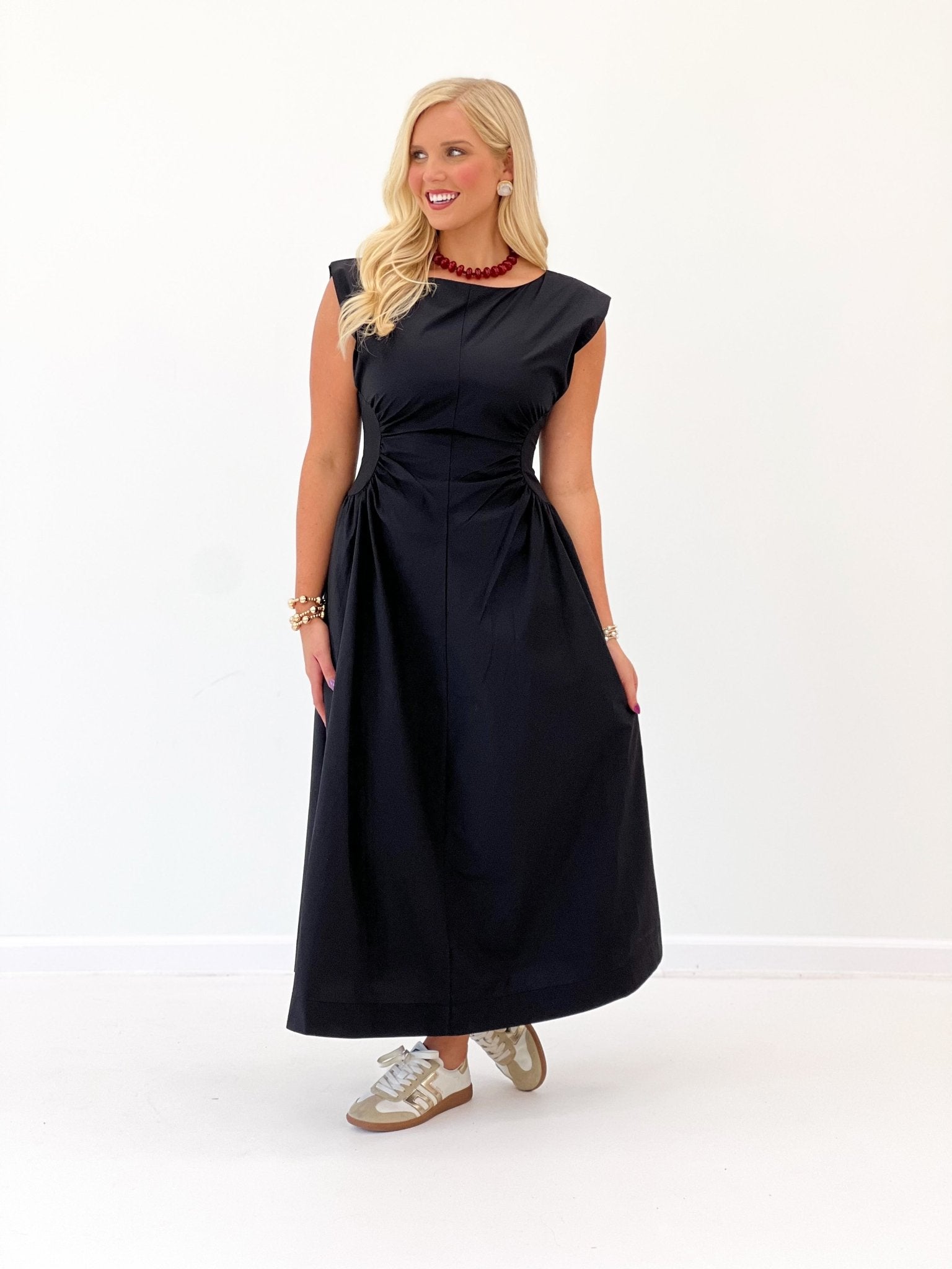 Side panel detail on a fitted midi dress
