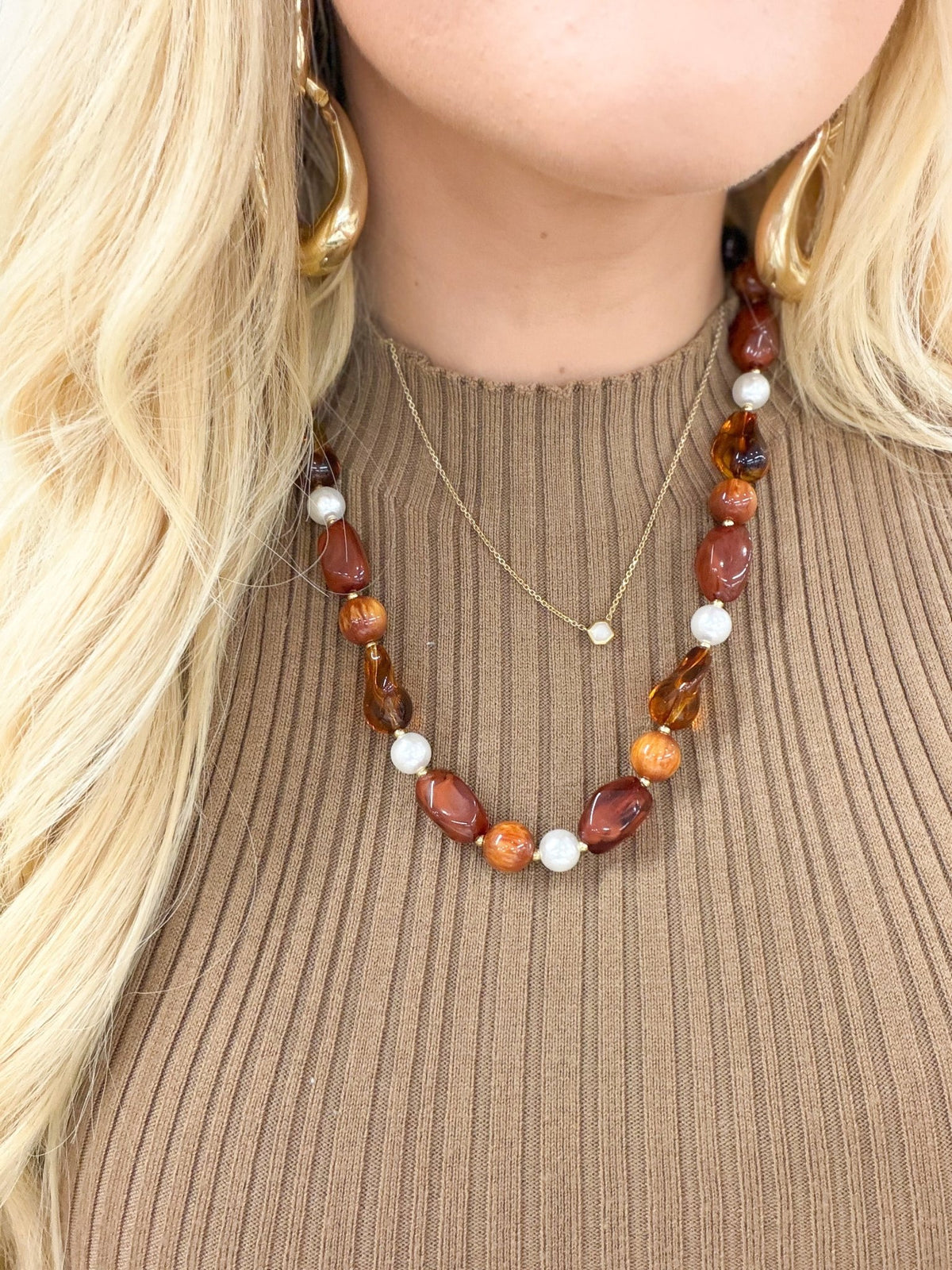 Brown tortoise beaded necklace in a single strand